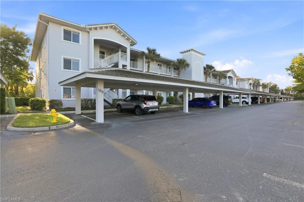 Photo of 7819 Regal Heron CIR #8, NAPLES, FL 34104 (MLS # 226015530)
