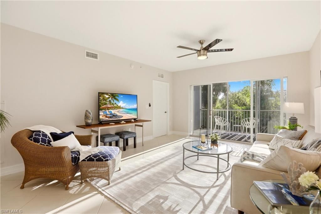 Photo of 7819 Regal Heron CIR #8, NAPLES, FL 34104 (MLS # 226015530)