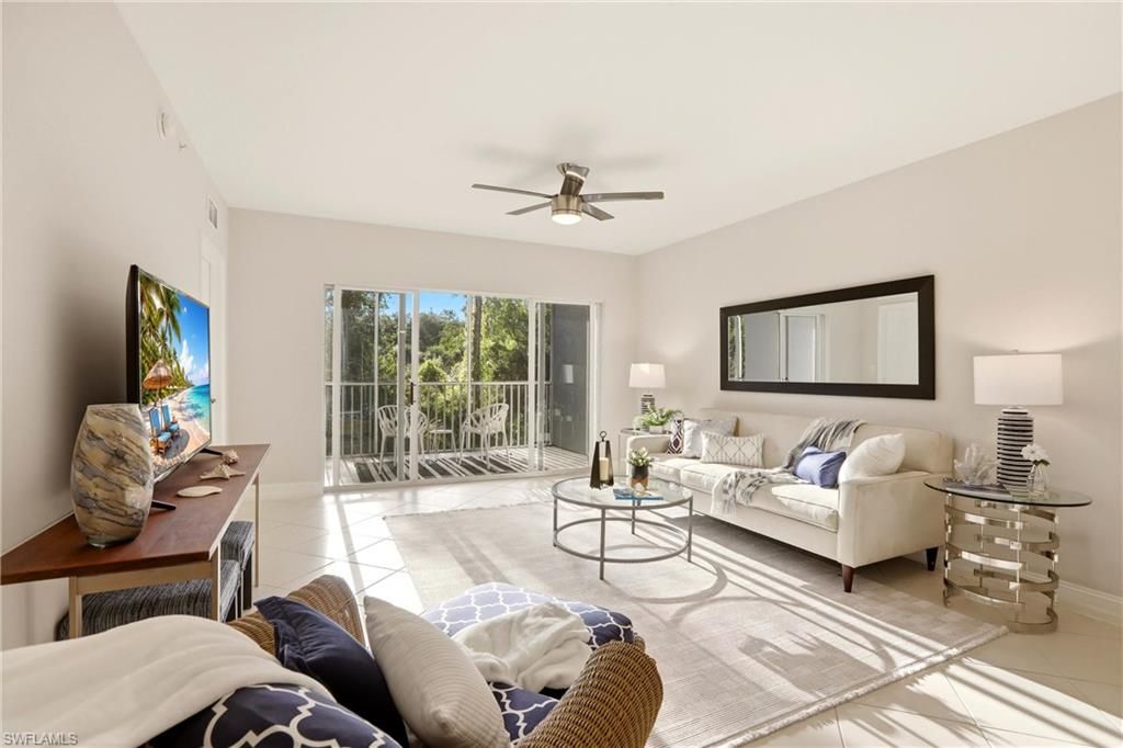 Photo of 7819 Regal Heron CIR #8, NAPLES, FL 34104 (MLS # 226015530)