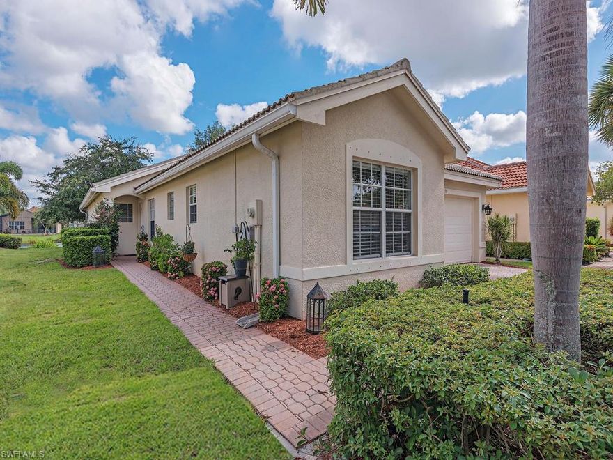 A rare Monte Carlo with an open floor plan and the den converted into a 4th bedroom. Located on a neighbor-friendly street in the highly sought after Saturnia Lakes neighborhood, offering access to one of the best school districts in the county. This 4 bedroom 2 bath has a south-facing extended lanai with a lake view – a great area for entertaining. Upgrades include freshly painted interior and custom solid wood crown molding in all common areas. Custom milled tall baseboards throughout. Beautiful laminate wood floors in all common areas. Newer A/C with digital thermometer and remote access. Guest bathroom has granite counter tops and glass vessel sink. The kitchen features a new back splash over the counters and stainless appliances. Energy efficient LED lighting throughout common areas. Wired and monitored alarm system, cable and high speed Internet included in the HOA fees. Gated community with 24-hour guard gate and plenty of amenities including two pools, fitness center, billiards room, café lounge and beautifully updated clubhouse with large ballroom.