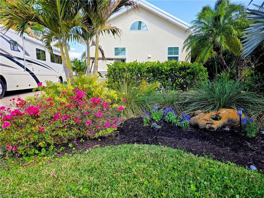 Wake up to breathtaking views in this east facing lot where every morning begins with coffee and a glowing sunrise. Lot 31 is wrapped in a lush, tropical ambiance, enhanced by a beautiful fountain that creates a soothing soundtrack throughout the day and evening. Sliding glass doors open wide to blend indoor and outdoor living, complete with outdoor screens for fresh breezes and indoor blinds for privacy, while thoughtfully placed outdoor lighting sets the perfect mood after sunset. A nearby dock is a handy fishing spot, and the buried propane tank means you’ll never run out of fuel in the middle of cooking or entertaining. Inside, the space is both stylish and functional, featuring tile floors throughout, a residential refrigerator and a stunning island complete with a sink and dishwasher, complemented by matching high chairs perfect for casual dining or entertaining guests. A 75 inch adjustable flat screen TV anchors the living area, creating an ideal spot for movie nights or game days. The home includes a washer and dryer for convenience, a beautifully finished tile shower, a dedicated storage area, and a versatile loft that adds extra storage or sleeping space. A comfortable sleeper sofa makes hosting effortless. The outside patio includes an umbrella, patio table and 4 matching chairs. This pet friendly, golf cart community offers a wide array of luxurious amenities that combine relaxation, recreation, and fun, all in one place. With a prime location on the Caloosahatchee River, enjoy stunning views and a variety of activities to keep you entertained. Take a dip year round in the large, heated pool, or unwind and relax in one of the two hot tubs. Enjoy drinks by the cabana pool bar while soaking up the sun, and when you’re ready for more, head to the pool clubhouse for a game of ping pong or work out in the exercise room. For some friendly competition, challenge your neighbors to a game of bocci or shuffleboard, or practice your swing on the beautiful putting green. Enjoy a variety of card games or let loose with remote control cars and boats. The River Clubhouse offers even more fun with a full service bar, billiards, dancing, bingo, and bunco nights.  On Saturday mornings watch the model trains chug along the tracks, crossing over bridges and weaving through tunnels as they pass through miniature villages, the tiny houses and towering structures add a sense of charm to the scenery.  Relax and take in the peaceful surroundings from the gazebo, or enjoy easy access to the boat dock, ideal for your adventures on the river. Convenient trailer and boat storage facilities are available, so you’ll always have a spot for your gear. Conveniently located near the R/C racetrack and the Creations Guild, this property offers a rare blend of serene island living and modern amenities, an inviting escape designed for comfort, style, and unforgettable views! Come see what makes this place so special and start living the life you’ve always dreamed of!