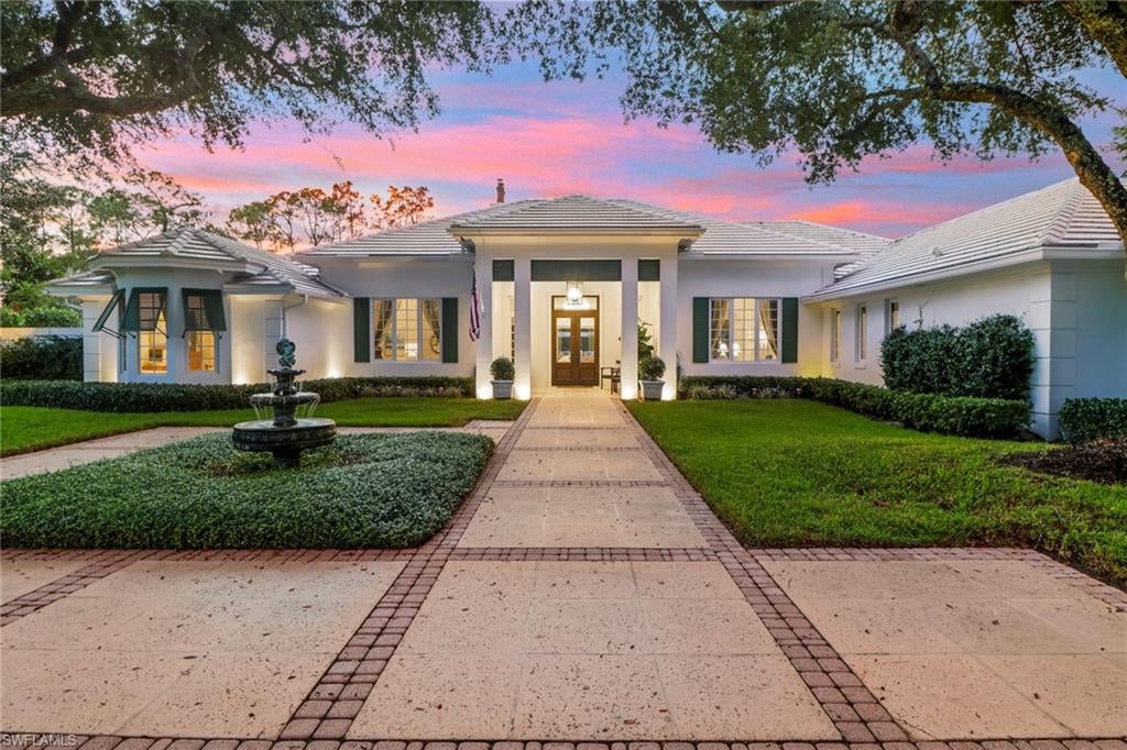 Photo of 13101 Pond Apple DR E, NAPLES, FL 34119 (MLS # 225071013)