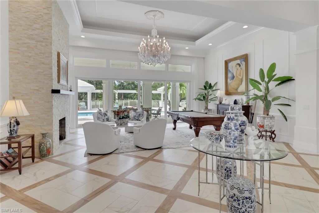 Photo of 13101 Pond Apple DR E, NAPLES, FL 34119 (MLS # 225071013)