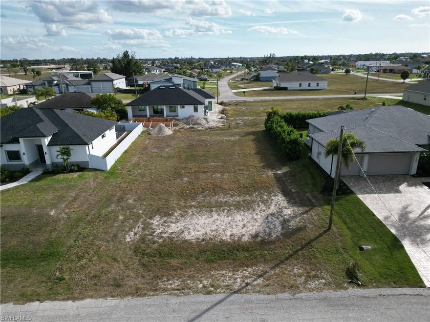 This vacant lot at 3238 NW 21st Terrace in Cape Coral, FL offers a great opportunity to build in an expanding area of the city. The property is located across the street from a scenic water canal, adding to the appeal of the surrounding setting. Surrounded by nearby homes, the lot is conveniently located close to local schools, making it suitable for a variety of future plans.

Everyday essentials are just a short drive away with grocery stores and local shopping nearby. Pine Island Road is easily accessible and features a wide selection of restaurants, fitness centers, and retail services, adding to the convenience of this location.

With easy access to nearby amenities and main roadways, this lot is a solid choice for those looking to build in a growing Cape Coral neighborhood.