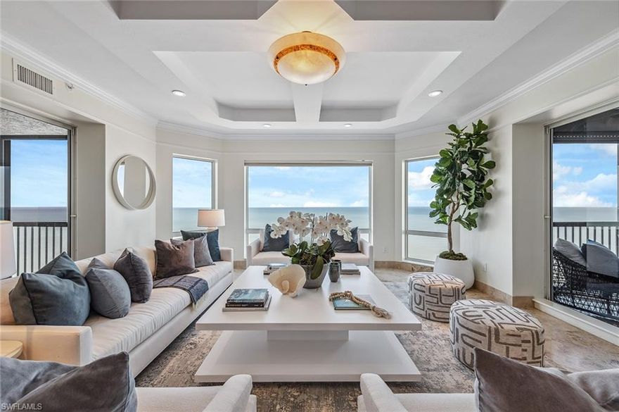 Gorgeous gulf and beach views! High floor gulf view residence directly on the beach in the private gated community of Bay Colony. Featuring panoramic views of the Gulf of Mexico through hurricane-impact glass picture windows and floor-to-ceiling glass sliders off the breakfast area and the primary bedroom. This highly sought-after design welcomes you into an elegant entry foyer and spacious living area boasting tile and wood floors, elegant moldings, lighting and trim and a separate dining area. The open kitchen and den area offer plenty of room for entertaining family and guests including two full guest bedrooms, both with en suite baths. Extra storage at garage level. The Biltmore amenities include an impeccably renovated lobby with 24-hour staffed front desk, two guest suites, fitness center, social rooms and a resort-style pool. Bay Colony residents enjoy the use of their own private beach club and restaurant, a tennis club, as well as use of the amenities of Pelican Bay.