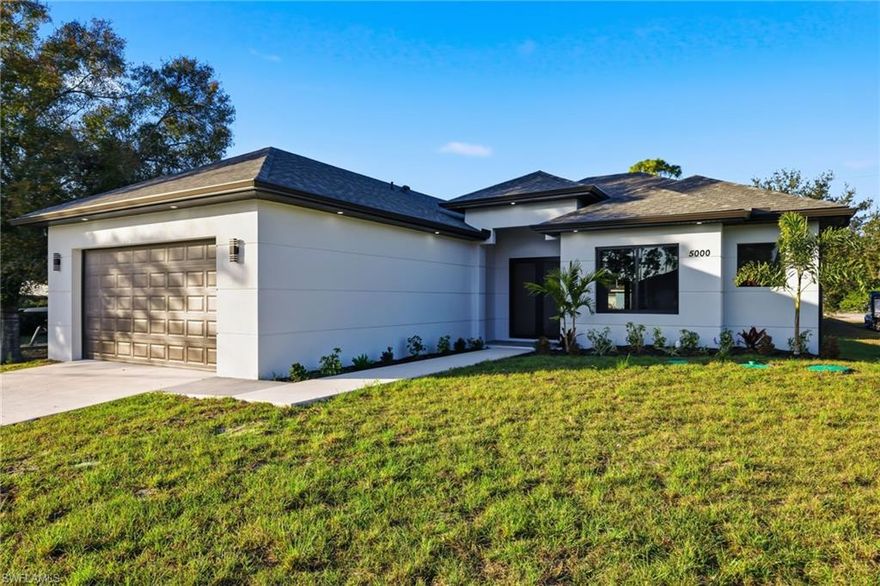 You have to see this Stunning Brand New 3-Bedroom+den, 2-Bathroom home just outside of Fort Myers. The home was designed and built with no expense spared offering several high-end finishes and upgrades at every turn! The open kitchen showcases a large island overlooking the living room that's perfect for entertaining. It boasts quartz countertops, stainless steel appliances, and real wood cabinetry with slow close cabinets.  The living room offers tray ceilings prewired for wall mount tv, and features oversized sliders, and bay windows that flood the space with natural light. The primary suite includes dual sinks and a large freestanding tile shower with a glass enclosure and large walk in closet with space for lots of storage. Stylish tile flooring runs throughout every room for added comfort.  Other additional features include impact doors and windows throughout, epoxy flooring in the garage, and stunning double impact glass front doors that add to the home's appeal while the indoor laundry features elegant cabinetry and laundry sink. Every upgrade imaginable has been included, from 5 1/4 baseboards to the tray ceilings, this home offers the finest construction quality on the market.  The home also offers a builder warranty for peace of mind. When you step outside to the spacious patio under truss with outdoor wet bar and space for grilling that is perfect for family gatherings, and entertaining. The expansive backyard also has plenty of room for a pool and additional landscaping. This space makes for the perfect private outdoor oasis. This home is not located in a flood zone, so no flood insurance is required. Conveniently close to Fort Myers, I-75, the airport, and popular sports venues including Boston Red Sox and Minnesota Twins stadiums, this exceptional home is one of the nicest available on the market today.  Don’t miss this incredible opportunity—schedule your private showing today!