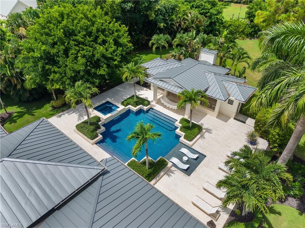 Photo of 233 Ridge DR, NAPLES, FL 34108 (MLS # 225067100)