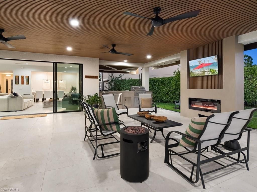 Photo of 13560 Mandarin CIR, NAPLES, FL 34109 (MLS # 226012125)