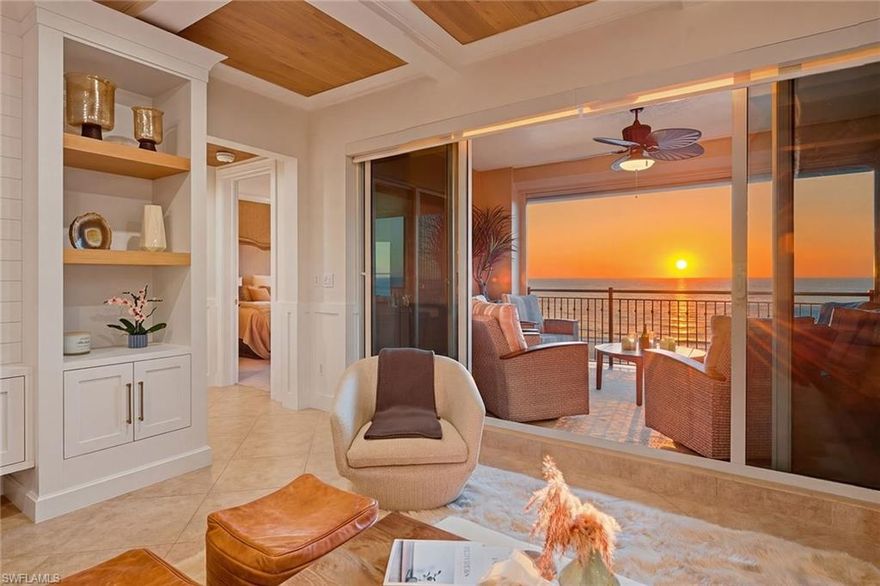 Perfectly positioned with desirable western exposure to enjoy breathtaking sunsets on Marco Island’s award-winning, two-mile crescent-shaped beach, this updated front-unit residence captures sweeping, unobstructed views of the Gulf’s turquoise waters, pristine white sands, and lush tropical grounds, offering an exceptional beachfront lifestyle within the prestigious and highly sought-after Madeira community. Ideally located adjacent to the JW Marriott Marco Island and just moments from Residents’ Beach, the impressive setting provides the rare balance of tranquil seclusion and effortless access to world-class dining and vibrant island amenities and activities. Offered turnkey furnished for immediate enjoyment, the thoughtfully designed floor plan features three bedrooms and two-and-a-half baths, blending refined coastal elegance with everyday comfort. The living and dining areas are beautifully enhanced by diagonal-set porcelain tile flooring, a striking copper ceiling with wood inlay, crown molding, recessed LED lighting, custom built-ins, and quartzite-topped cabinetry, all flowing seamlessly toward expansive Gulf views. The chef’s kitchen, with a beach and water view, is exquisitely appointed with quartzite countertops and island, full quartzite backsplash, premium cabinetry, under-cabinet lighting, a compass inlay detail, and high-end appliances including a Wolf gas cooktop, French-door wall oven, Sub-Zero refrigerator, built-in microwave, dishwasher, and beverage refrigerator. A versatile bedroom/den with glass-front barn doors, custom cabinetry, electric shades, and private balcony access serves effortlessly as a home office, media room, or guest retreat. The serene primary suite offers plush carpeting, breathtaking Gulf views, electric blinds, custom closet systems, and a spa-inspired bath featuring marble vanities, jetted soaking tub, walk-in shower with dual showerheads, and elegant marble accents. A gracious guest suite with ensuite bath, a stylish powder room, and a well-equipped laundry room add to the home’s functionality. Outdoor living is elevated with two balconies, including the expansive covered beachfront balcony—perfect for relaxing or entertaining while enjoying unforgettable sunsets over the Gulf—complete with porcelain tile flooring, ceiling fan, impact glass, and electric roll-down storm shutters. Madeira residents enjoy an exceptional amenity collection including a resort-style beachfront pool and spa, BBQ area, pickleball and tennis courts, fitness center, billiards and theater rooms, guest suites, and 24-hour security, all set within one of Marco Island’s most coveted beachfront locations where peaceful coastal living meets unparalleled convenience. The highly desirable Madeira building is ideally relaxing on the beach, walking, fishing and beach yoga, and convenient to everything that we love about Marco Island, including yacht clubs, executive airport, boutiques, library, parks, museum, and popular restaurants.