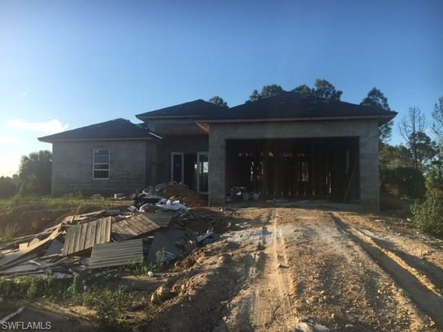 Brand New construction on 2.27 acres.  That's right 2.27 Acres!! What a Great Deal!  Ready in 45 days or less!  Why build your home on 1.14 acres when you can have more for your money on 2.27 acres.  Pick your colors and live the house of your dreams. Beautiful open floor plan. This home will feature 3 bedrooms plus a den, 2 bath,  beautiful kitchen with wood cabinets, granite counter tops and stainless steel appliances. Dual sinks in the master bath, Porcelain Tile throughout the home and Impact windows. Too many features to list.  At this price this home will go fast! Don't wait. Call Today For More Details.