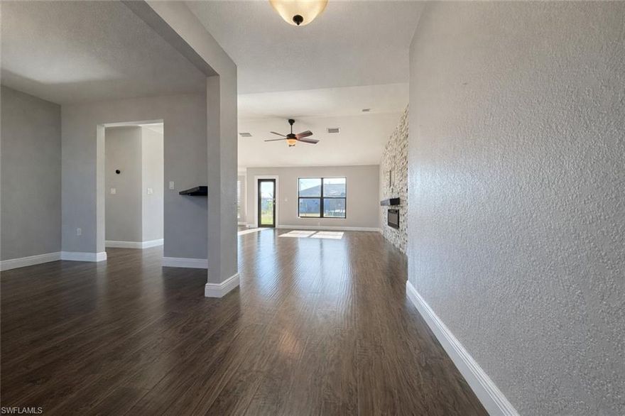 Spacious 5-Bedroom Home in Quiet Cape Coral Neighborhood – Pet Friendly!

Welcome home to this beautifully maintained 5-bedroom, 2-bath residence located in a quiet, family-friendly Cape Coral neighborhood, offering comfort, space, and modern upgrades throughout.

Inside, enjoy new flooring and an inviting layout designed for everyday living. The spacious kitchen is equipped with stainless steel appliances, ample cabinetry, and a pantry—perfect for family meals and entertaining. The main living area is enhanced by an electric wall fireplace, adding warmth and ambiance.

The downstairs primary suite is a true retreat, featuring a private sitting area and a luxurious bathroom with dual sinks, a soaking tub, separate walk-in shower, and a private water closet. Additional living space includes a flexible office—ideal for a home workspace or playroom—and a loft area for relaxing, studying, or entertaining.

This home also offers a large indoor laundry room with washer and dryer and plenty of storage. Impact windows throughout provide added safety and energy efficiency, while a whole-house reverse osmosis (RO) water system ensures excellent water quality throughout the home.

Step outside to enjoy a fully fenced yard, perfect for kids and pets, along with a screened front porch and a large rear lanai for outdoor living. The epoxy-coated garage floor and large closets in every bedroom add even more convenience.

? Spacious, upgraded, and located in a peaceful neighborhood—this home truly has it all. Schedule your showing today!

* $2,495 a month
* First ($2,495) & Security ($2,495)
* $65 per Application per Adult. All Adults MUST Apply!
* Pets allowed with pet rent
* NO smoking
* NO Previous Evictions
* 2.5 times monthly rent in Income ($6,237)
* 1 month of Pay Stubs