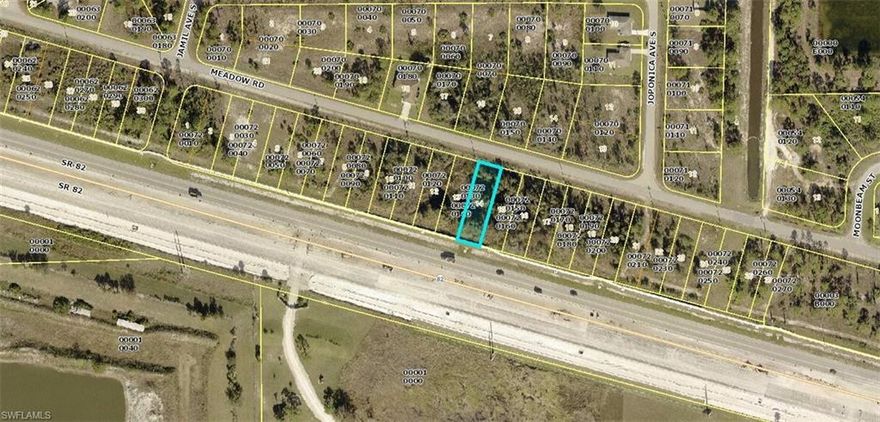 Excellent opportunity with a commercial lot with frontage on the newly widened St Rd 82.  Just a short drive to Fort Myers and Punta Gorda airports, two spring training facilities and beaches!