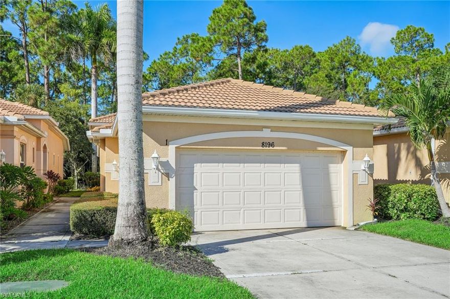 One or more photo(s) has been virtually staged, AI generated or rendered.  Step into a home that truly simplifies life in Naples, where comfort, security, and convenience come together in one of the area’s most desirable gated communities. Located in The Sanctuary at Blue Heron, this beautifully maintained 3 bedroom, 2 bath attached villa lives like a single family home while offering the ease of lock and leave living. Whether you’re heading north for the summer or simply enjoying a low maintenance lifestyle, everything here is designed to give you peace of mind. From the moment you walk inside, you’re welcomed by soaring vaulted ceilings and a bright, open layout that feels both spacious and inviting. Fresh paint and updated lighting create a clean, modern atmosphere, while the split bedroom floor plan offers ideal privacy for guests or visiting family. At the heart of the home, the kitchen is ready for its next owner with brand new, never used stainless steel appliances, making this a true move in ready opportunity. Sliding doors lead to your west facing screened lanai, where peaceful preserve views create a quiet backdrop for morning coffee or evening sunsets, offering your own private retreat just steps from the living space. The primary suite is generously sized and thoughtfully designed with dual vanities, a soaking tub, and a large walk in closet, creating a comfortable place to unwind at the end of the day. What truly sets this home apart is the combination of features that deliver both value and peace of mind, including a rare 2 car garage providing secure parking and additional storage for beach gear, bikes, and more, full impact resistant windows and doors so no shutters are required, and a new tile roof installed in 2021 for long term durability. As part of a maintenance free community, landscaping, exterior upkeep, and more are handled by the association, allowing you to focus on enjoying your time in Naples rather than managing a home. The Sanctuary at Blue Heron offers a resort style lifestyle with a heated community pool, renovated fitness center, tennis and pickleball courts, a clubhouse for gatherings, and miles of sidewalks for walking and biking in a safe and friendly environment. All of this is conveniently located just minutes from shopping, dining, and everyday essentials, and approximately 5 to 6 miles from 5th Avenue South and Naples’ world famous white sand beaches. Priced at $395,000, this home stands out as one of the strongest values in the community, with the next comparable villa currently listed 20,000 higher and others priced above that, offering immediate built in equity in today’s market. If you’ve been searching for a home that delivers comfort, protection, low maintenance living, and true Naples lifestyle appeal, this is an opportunity you do not want to miss.