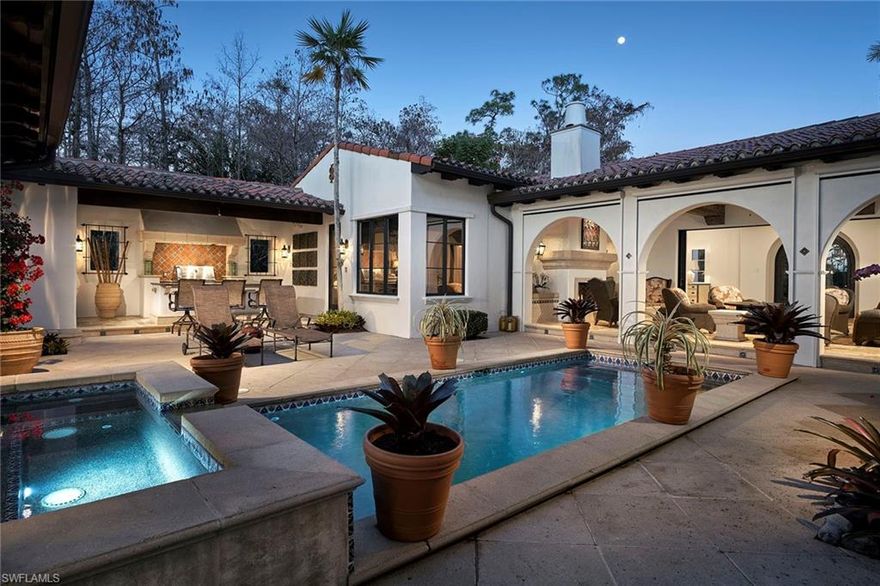 This home exudes California cool with its whitewashed stucco, extensive beam ceilings and seamless indoor/outdoor living surrounding a private intimate courtyard. The over 5,100 square foot 4-bedroom, 4.5-bath great room plan includes a study and a second story bonus/game room and resides on an extremely private lake and double fairway view homesite bordered on one side by a protected preserve. The open great room plan includes an updated gourmet kitchen with Wolf range and Sub-Zero appliances. Numerous sliders and French doors open to a spacious outdoor living space perfect for entertaining family and friends and includes three covered lanai spaces, one with automated screens and a gas fireplace, a second outdoor bar and gas grill and a third with ample dining space overlooking the sparkling lake and golf course beyond. Additional features include an attached three-car garage with golf cart space, wet bar, desk and butler’s pantry with Sub-Zero wine column and private elevator. A world of luxury awaits you in Estuary at Grey Oaks just minutes from world-class shopping, dining and beaches.