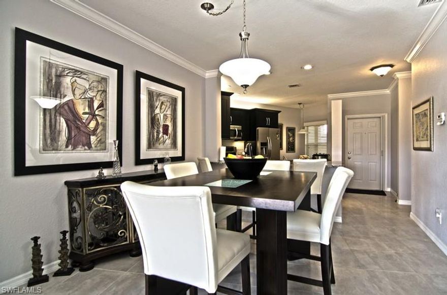 *ABSOLUTELY GORGEOUS FIRST FLOOR CONDO WITH GOLF COURSE VIEW IN THE HEART OF NAPLES*VERY TASTEFULLY UPDATED*NEW KITCHEN AND BATHROOM WOOD CABINETS WITH GRANITE COUNTER TOPS*NEW STAINLESS STEEL APPLIANCES*NEWER WASHER AND DRYER*NEW TILES THROUGHOUT*FRESHLY PAINTED*CROWN MOLDING*