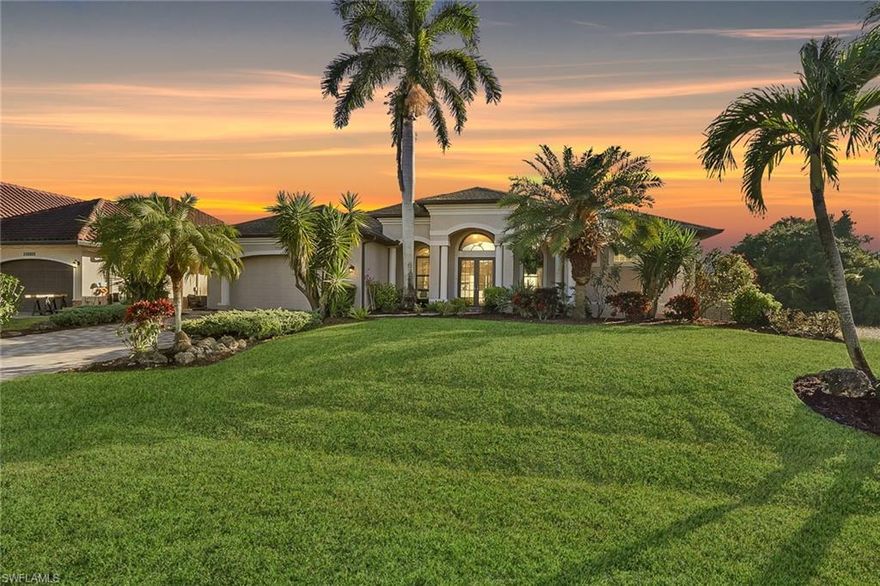 Experience the perfect blend of architectural detail and resort-style living. Nestled in the heart of the Coral Oaks Golf Community, this custom estate greets you with soaring 12-foot backlit tray ceilings and grand columns. The heart of the home is a gourmet kitchen featuring granite surfaces and a walk-in pantry, perfectly situated for hosting in the adjacent formal dining room and a dedicated wet bar designed for seamless entertaining.
The interior flows outdoors through 90-degree "vanishing" sliders that lead to a private sanctuary. Relax on the expansive pavered lanai, take a dip in the custom infinity-edge pool, or unwind in the integrated spa. The property offers total peace of mind with a new roof installed in 2023 and a brand-new fence added in 2025 for ultimate privacy. With a newer 20' dock and the clubhouse just a short walk away, your Florida lifestyle is ready today. This home is meticulously updated with fresh custom paint, newer appliances, and a modern security system. For a truly turn-key transition, the seller is willing to include the furniture as part of the sale.