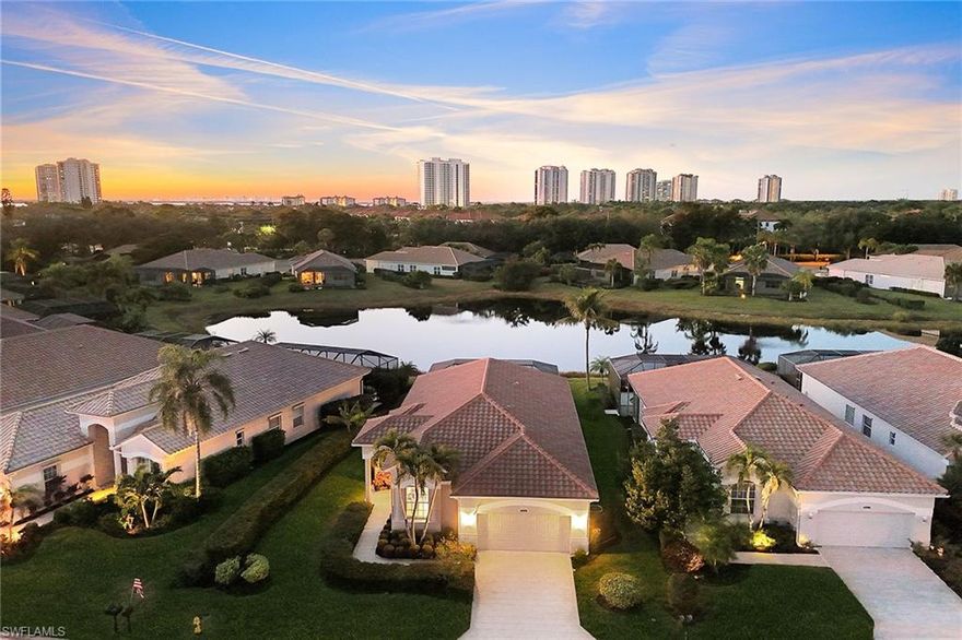 Full lake views create a serene and ever-changing backdrop in this beautifully updated residence in the Capri neighborhood of Pelican Landing. Sunlight reflects across the water throughout the day, while tranquil morning views and colorful evening skies can be enjoyed from the comfort of home. You can take in the expansive lake views from multiple areas of the residence, including the living room, breakfast area and primary bedroom, creating a seamless connection between the interior spaces and the natural setting beyond. The open floor plan was established during a comprehensive renovation in 2017, when the kitchen, baths and flooring were fully remodeled, plantation shutters were added and two interior walls were removed to enhance flow and natural light. The reimagined design offers an inviting environment for gathering or enjoying quiet moments overlooking the water. Notable improvements have continued over time, including a new roof in 2018, a new pool heater in 2020, a new air conditioning system in 2023, and a full re-piping of all water lines along with new bedroom flooring in 2024. A complete list of improvements is available upon request. Residents of Pelican Landing enjoy a gated community lifestyle with access to a private beach park, tennis and pickleball facilities, a fitness center, community center and opportunities for kayaking along Spring Creek. Scenic preserves, recreational paths and thoughtfully maintained grounds contribute to the community’s established coastal character.