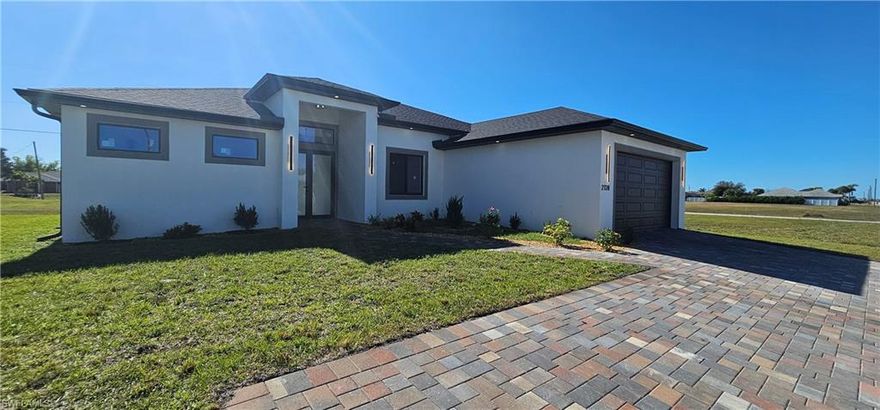 Beautiful new-construction home featuring 4 bedrooms and 3 full bathrooms, luxury finishes, a large kitchen island, laminate flooring, and a decorative fireplace. Includes a whole-house alkaline water filtration system, washer and dryer inside, LED lighting throughout, automatic lawn irrigation, and a large parking area that fits approximately six vehicles.