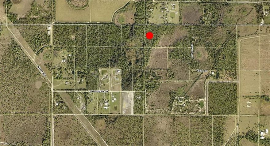 5 Acre parcel in North Fort Myers just off of Nalle Road zoned AG-2. Approx. 330x660 with eastern rear exposure. Subject has no frontage on Nalle Road, Owner have an entrance trough an Easement, there is no known deeded ingress/egress to the property from Nalle Road at this time. Seller have survey for this lot. Lot dimensions estimated per public record.