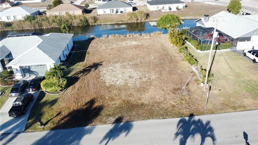 Build your dream home on a cleared, quarter-acre (approximately 10,000 Sq. Ft.!) FRESHWATER CANAL lot in Cape Coral — SEAWALL and DOCK already in place! NO OWLS AND NO TORTOISES per city of Cape Coral. 

These lots are NOT IN A FLOOD ZONE and they already have CITY WATER, SEWER AND IRRIGATION which is exactly what buyers, investors and builders are looking for right now. No trees, no delays — just a clean, build-ready lot in a city that continues to grow fast.


With more than 400 miles of navigable waterways, Cape Coral offers one of the largest canal systems in the world — ideal for boating, fishing, and water lifestyles buyers crave. We have multiple waterfront lots available, so whether you’re building now or investing for the future, this is a smart move. Drive by today and make your offer!

Other lots available: 
227 Cultural Park Blvd N
1906 NE 13th Pl
2300 NE 13th Ave 

Professional Commercial Lot also available with all utilities in place: 711 SE 8th St