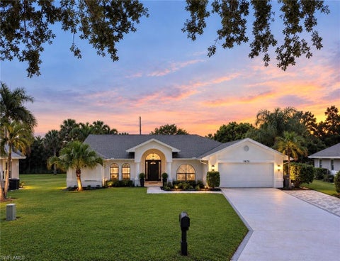 Photo of 9878 Country Oaks DR, FORT MYERS, FL 33967 (MLS # 226038400)