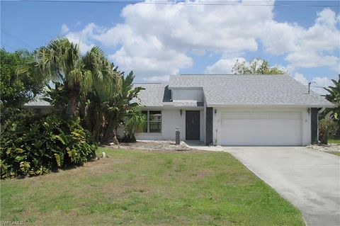 Photo of 903 SE 20th CT, CAPE CORAL, FL 33990 (MLS # 226018959)
