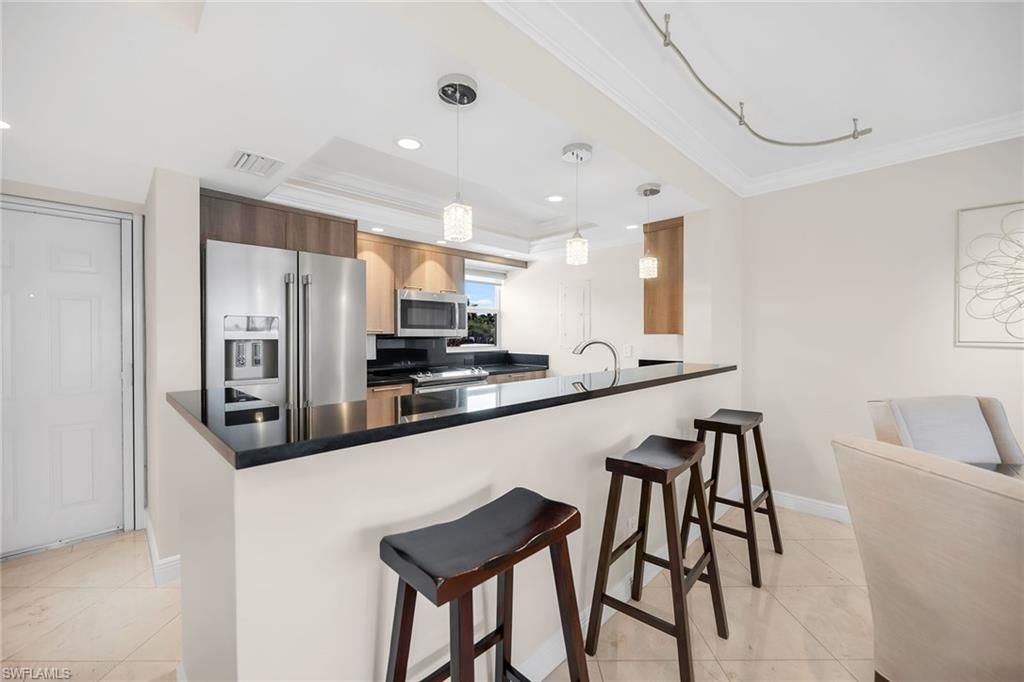 Photo of 300 Park Shore DR #2E, NAPLES, FL 34103 (MLS # 225073128)