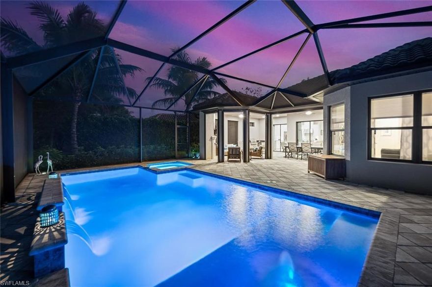 Discover a rarely available Lazio model Turnkey, boasting stunning outside covered Living with Pool spa and fireplace and summer kitchen. . This extraordinary home is a true gem on the market, offering luxurious upgrades and a breathtaking setting. As you enter through the welcoming foyer, you’re immediately drawn into the heart of the home. The open-concept kitchen and living area is designed with both elegance and practicality in mind. Crown moldings accent the ceilings, adding a touch of sophistication throughout, while a neutral color palette provides a serene backdrop that highlights the home’s natural beauty. The layout of this Lazio model is not only sought-after but beloved for its functional flow, making daily living and special gatherings equally delightful. Moving into the primary suite, you’ll find a private haven that offers more than just a place to rest. Expansive windows frame the private lanai view.  bringing a sense of tranquility into the room. Each guest bedroom is a comfortable en suite retreat, ensuring privacy and elegance for family and guests alike. The home’s thoughtful upgrades, including a AC handler, tankless water heater, ensure modern comfort at every turn. Outside, the lanai is perfect for enjoying the Florida lifestyle, complete with a outdoor refrigerator fireplace, covered outdoor living, Electric, Storm Smart Shutters. That extends seamlessly from the kitchen to the outdoors. Every corner of this home has been designed to offer a refined, welcoming atmosphere that truly stands out. Optional memberships are available for Golf, Beach & Marina. CDD IS PAID