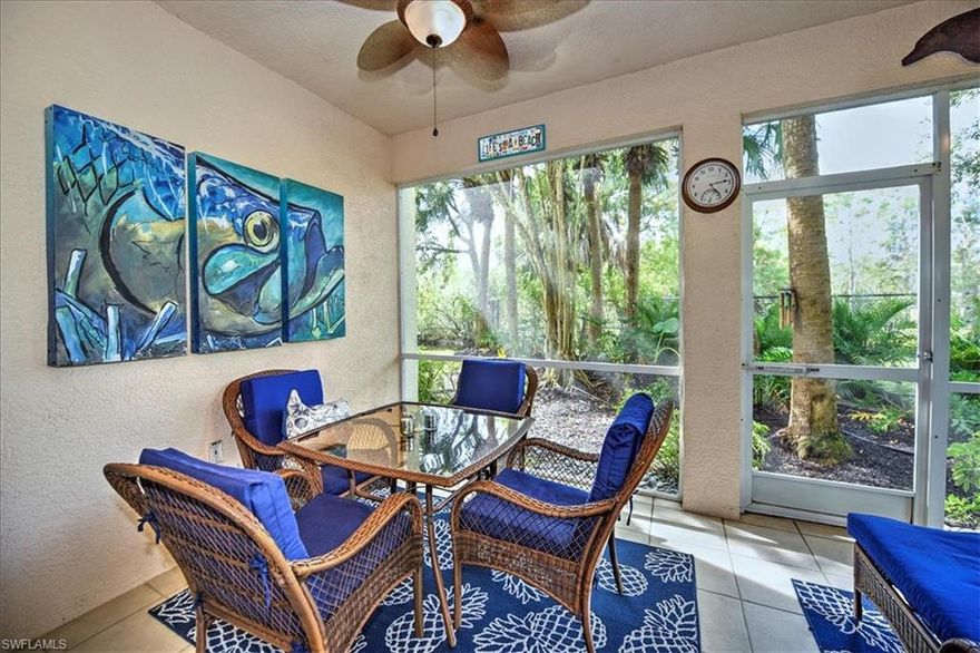 PRIVATE End Unit at the end of the street. Huge front yard with privacy wall & beautiful landscaping. Plenty of guest parking out front. Crown molding, French doors, tile on the diagonal in living room; carpet in the bedrooms. Sliding glass doors in living room open to a private lanai with tropical western view & gorgeous sunset afterglow colors. Kitchen has black granite countertops with white cabinets, breakfast bar & breakfast nook surrounded by large corner windows. Stainless steel appliances include a French door refrigerator & convection oven. Master suite features a large walk-in closet and bath with dual sinks, make-up vanity area, linen closet, and walk-in shower. Laundry room leads to garage. Hawk's Nest residents have their own community pool in addition to the world-class Club & Spa with 3 pools, hot tub, waterslides, tennis, spa facilities, sauna, steam room, attended fitness & exercise rooms, yoga & pilates room and 3 restaurants in the community, including the pool-side Gator Grill.  CDD PAID IN FULL! Optional Golf & Beach memberships available.