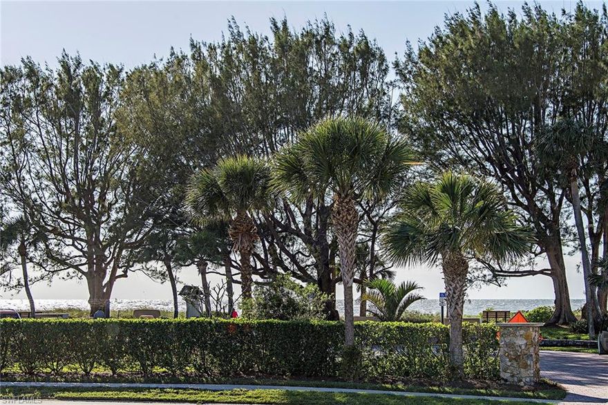 You are at the beach. From the best location in Port Au Villa, you will enjoy strong, stunning views of the Gulf of Mexico across your private Moorings Beach Club. The coveted western exposure provides plenty of natural light and breathtaking sunsets. Just imagine relaxing with a cool drink while watching the horizon glow orange with dark silhouettes of palm trees in the foreground. Absolutely spectacular. Enjoy lazy days relaxing at the club's beach and park or at your heated bayfront pool. This renovated, turnkey-furnished end-unit boasts electric storm shutters and impact-glass sliding windows in the sunroom, washer/dryer hook-ups and brand-new carpeting. Port Au Villa's flexible rental policy is great for investors and a list of available renters is typically on-hand. Also, on-site docks are sometimes available for lease or purchase. This is a terrific central, beachfront and bayfront location just moments from dining options at the Edgewater and Naples Beach Hotels, as well as Charleston Square. It is also just a few minutes drive to all of the world-class shopping, dining and entertainment in Old Naples, Venetian Village, Waterside and Mercato. No land lease.
