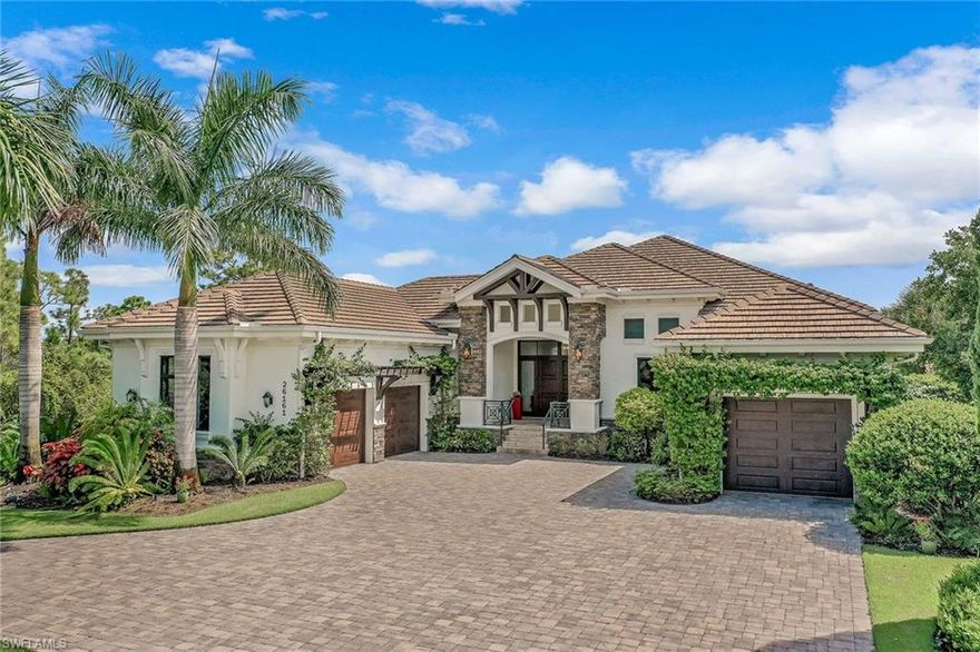 Stunning architectural details pair with the finest options and upgrades in this luxury home built by Stock in 2017 on one of the largest and very private lots in Bonita Bay. The open great room floor plan features a spacious master and exquisite guest suite in the main house, and a living area with a kitchenette and two separate suites in the guest part of the house. In addition, there is an office, powder room, a large walk-in pantry, three-car air-conditioned garage, and a panoramic rooftop terrace. This gorgeous residence boasts upscale finishes and designer touches. Chef's kitchen with custom cabinets and appliances, leathered granite kitchen island, two refrigerators and a six-burner gas stove, coffer and tray ceilings, designer light fixtures. Alfresco living defines the Floridian lifestyle with an exquisite swimming pool and spa, multiple sitting areas, fire pit and a full outdoor kitchen, perfect for entertainment. Bonita Bay with multiple golf and tennis courses, private beach, marina and exceptional amenities, is just minutes from some of the best shopping, dining and entertainment in Southwest Florida.