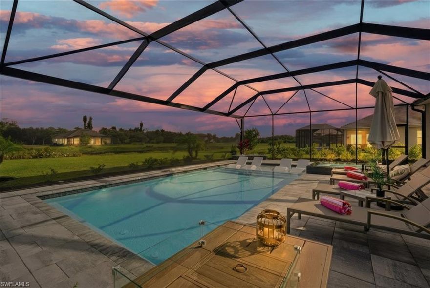 Feel like you’re living in the country, yet just minutes from Babcock Ranch and the Caloosahatchee River — stop! Check out this showstopper at 17120 Serengeti Circle — a nearly new, 2,724 sq. ft. Richmond floor plan with a custom pool, set on an almost full acre inside the exclusive, private gated community of Serengeti in Alva. This stunning single-level residence blends luxury craftsmanship with effortless indoor–outdoor Florida living. An open-concept design connects the Great Room, chef’s kitchen, and dining area — the true heart of the home — while expansive sliding glass doors lead to a breathtaking lanai and resort-style pool area. Featuring 4 spacious bedrooms, 3 full baths, and a 3-car garage, this home also includes a versatile den ideal for a private office, study, or media room. Every inch of this home showcases custom millwork and refined finishes including floating crown molding with uplighting in the foyer, den, family room, kitchen and primary suite, shadow-box accents in the foyer, den, kitchen and family room, coffered ceilings in the family room and primary bedroom, freshly painted interior in Sherwin-Williams “Shiitake,” and recessed halo lighting enhancing ambiance in key living spaces. The outdoor living space is truly exceptional with a heated 33’ x 15’ custom pool and 6' x 6' raised spa featuring wet walls and iridescent color-shifting tile, 3 LED pool lights plus 1 LED spa light for dramatic nighttime enjoyment, an expansive 50’ x 33’ screened lanai with no-see-um screening, six up/down LED sconces and a 50' picture-window screen for wide-open views. Serengeti offers true serenity — yet convenience is always close by. Within just 15 minutes you can enjoy Babcock Ranch for dining, shopping and entertainment, Caloosahatchee Regional Park with hiking/biking trails, campgrounds and kayak launches, the public Alva Boat Ramp, and multiple full-service marinas for direct river and Gulf access. An almost full acre of privacy, luxury finishes throughout, custom pool, and 2,724 sq. ft. of beautifully designed living space — all in one of Alva’s most desirable boutique communities. Discover the lifestyle you’ve been dreaming of at 17120 Serengeti Circle. Let the beauty of Serengeti welcome you home.