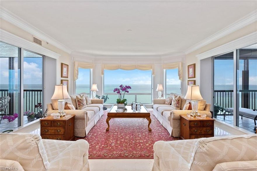 Gorgeous Gulf and beach views. Rarely available, higher 03 floor plan directly on the beach in the private gated community of Bay Colony in Pelican Bay. Featuring panoramic views of the Gulf of Mexico through oversized picture windows and floor-to-ceiling glass sliders off both the breakfast area and master bedroom. This highly sought-after design welcomes you into an elegant entry foyer and spacious living area boasting polished marble floors, elegant moldings, lighting and trim and a separate dining area. The open kitchen and den area offer plenty of room for entertaining family and guests, including two full guest bedrooms, both with en-suite baths. The Biltmore amenities include an impeccably renovated lobby with a 24-hour manned front desk, two guest suites, a fitness center, social rooms and a resort-style pool. Bay Colony residents enjoy the use of their own private beach club and restaurant, a tennis club, as well as the use of the amenities of Pelican Bay. Private golf memberships are available separately.