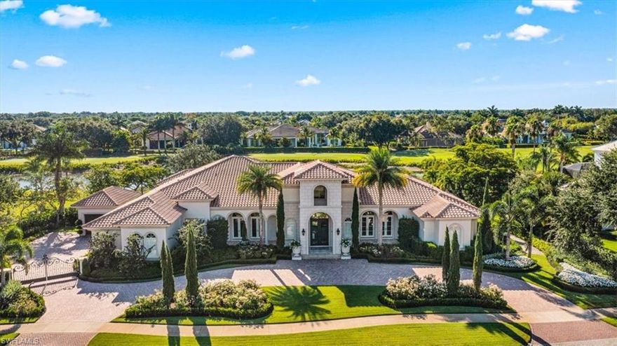 H6131- Welcome to this refined estate on a private cul-de-sac where gracious living meets easy Florida lifestyle. Both elegant and stylish, this Sand Dollar award winning home welcomes with polished marble floors and walls of windows leading to fantastic water and golf course views and an eastern exposure for sunny mornings and comfortable evenings. With a state-of-the-art media room, wine room with Wolf/Sub Zero wine refrigerators, two master suites and an enormous study with built-ins and gorgeous architectural detailing throughout, this home offers the space, functionality and style for which you've been searching, There is much more including a generous formal dining room and adjacent butler pantry, stunning chandeliers, spacious, Wolf-equipped gourmet kitchen, 4-car garage, plus all en-suite bedrooms to complete the list. Live al fresco on the spacious covered lanai with retractable screens, fireplace, outdoor kitchen w Wolf grill & bar area, custom infinity-edge pool
and spa plus plenty of gathering areas to meet every entertaining need. NEW ROOF and GUTTERS COMING SEPTEMBER 2022 to complete the upgrades. Award winning Quail West features gorgeous clubhouse & countless amenities.