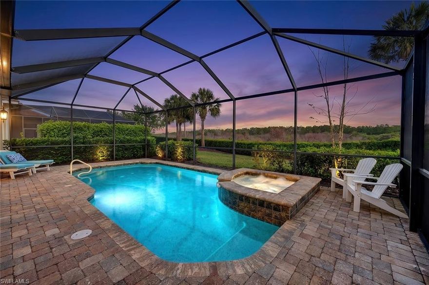Experience the ultimate Naples resort lifestyle in the prestigious gated community of The Quarry—a premier golf, boating, and beach club community known for its 500 acres of navigable lakes and world-class amenities.  This beautifully maintained single-story 3-bedroom + den, 2-bath pool home offers serene preserve views and a highly desirable open-concept great room floor plan, perfect for both everyday living and entertaining. Inside, you’ll find hardwood flooring throughout the main living areas, den, and bedrooms, along with a bright and airy layout that seamlessly connects the kitchen, dining and family room. The updated kitchen features quartz countertops, white wood cabinetry, tile backsplash, stainless steel appliances, electric cooktop, and pantry, plus a charming breakfast nook with direct lanai access. The spacious primary suite offers a private retreat with an en-suite bath, dual vanities, tub, glass-enclosed tiled shower and a large walk-in closet. Step outside to your screened lanai oasis, where a sparkling pool and spa, covered entertaining area and peaceful preserve backdrop create the perfect setting to relax and enjoy the Florida lifestyle year-round. Additional features include a freshly painted interior (2026), hurricane-impact door and windows, custom ceiling details, crown molding, custom lighting and a 2-car attached garage.  The Quarry offers an extensive amenity package, including approximately 500 acres of navigable lakes suitable for boating, kayaking, paddleboarding, fishing and water skiing. Community amenities include a newly renovated Beach Club with resort-style pool, lap pool, Tiki bar with poolside service, spa, tennis courts, pickleball, bocce, fitness center, on-site casual and formal dining options and a full-time activities director who operates social events year-round. Additional facilities include activity rooms, card room, and social spaces. Golf membership is optional and provides access to The Quarry Golf Lodge and the PGA-level Hurdzan-Fry 18-hole course. The Quarry represents a lifestyle defined by luxury, recreation and natural beauty with unparalleled access to world-class amenities.