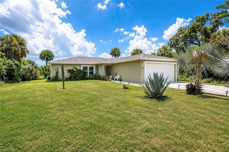 Welcome to 3061 NW Beechwood Cir. This exceptionally well-maintained 3-bedroom, 2-bathroom home is tucked away in a safe and quiet neighborhood and sits on a spacious 1/4-acre lot with no adjacent neighbors. Adding even more privacy, the property backs up to a large protected greenbelt, ensuring no future building directly behind the home. Inside, the home features a spacious kitchen complete with a large center island, pantry, and an open living area with a dedicated dining space. Moving to the primary suite, the master bedroom offers large bedroom space and a nicely sized master bath with his and hers dual vanity sinks. Inside also features the utility room and two additional guest bedrooms and a full guest bathroom. Moving to the exterior, the open rear lanai is a great area to relax and enjoy the Florida weather with family and friends. For added value and efficiency, the home is also equipped with energy-efficient solar panels to help lower monthly electric bills while offering long-term utility savings. This home is beautiful inside and out, Schedule your private showing today.