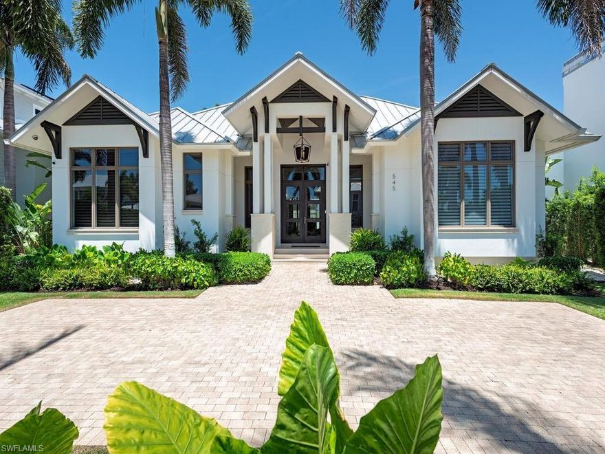 Discover an exquisite retreat in the heart of Olde Naples, just 2.5 blocks from 3rd Street South, featuring some of Naples’ most desirable shopping and dining experiences. Enjoy the sugar-white sands of the Gulf just moments away. This impeccably designed residence embodies refined coastal elegance, offering four lavish bedroom suites—each with a private ensuite bath and spacious walk-in closet—alongside a private study, stylish powder room and dedicated pool bath.
Every detail has been thoughtfully curated, from the oversized four-car garage with the option for car lifts to the seamless indoor-outdoor living experience. An expansive covered lanai, complete with a fully appointed outdoor kitchen, frames the sparkling pool and creates a captivating setting for sunset dinners and sophisticated entertaining. A rare blend of luxury, comfort, and prime location—this is Naples living at its finest.