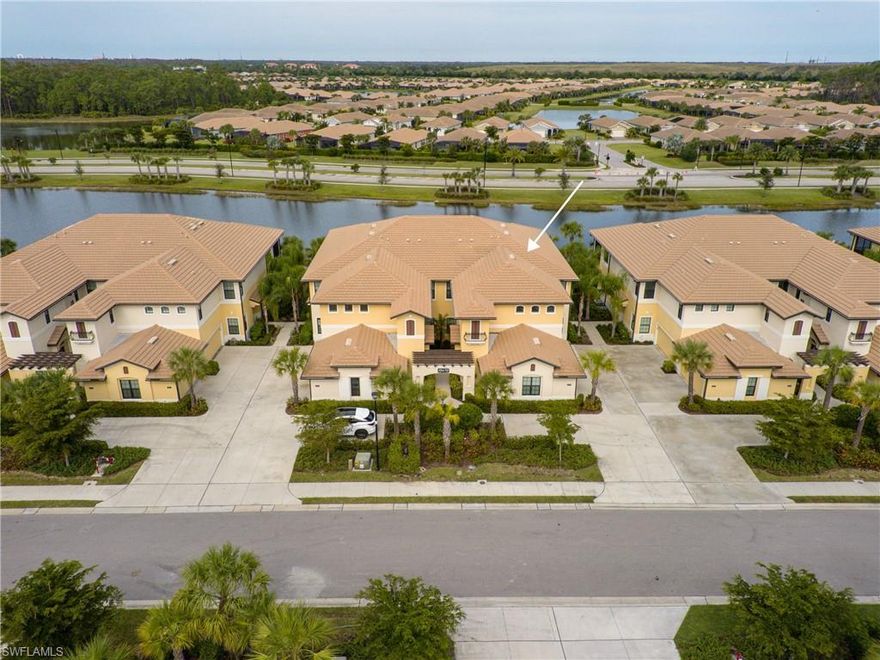 Gorgeous top floor WCI built carriage home located in The Casella neighborhood at Pelican Preserve, a 55+ amenity rich resort casual gated community with a convenient Fort Myers location. This well-appointed home with a stunning water view features: 3 spacious bedrooms, 2 baths, private elevator, gourmet kitchen with huge one level center island, formal dining, casual café area, large open great room design with 11' ceilings finished with elegant crown molding. The home office / flex room can be used any way you like while the large 29’ x 9' lanai provides the best in outdoor Florida living. The 2-car garage and private elevator provides additional storage space and convenience. Leave home feeling safe and secure that all windows and doors have energy efficient high impact glass to protect your home from the harshest weather conditions. Other improvements include: plantation shutters, professional grade Jenn Air brand appliances, additional wall cabinets in laundry room with utility sink, whole house water filtration system and 12" x 24" modern style rectangular tile in main living areas and closets. To learn more about this amazing home & community be sure to view both videos.