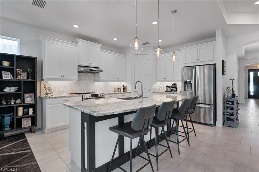 Photo of 16574 Crescent Beach WAY, BONITA SPRINGS, FL 34135 (MLS # 226006184)