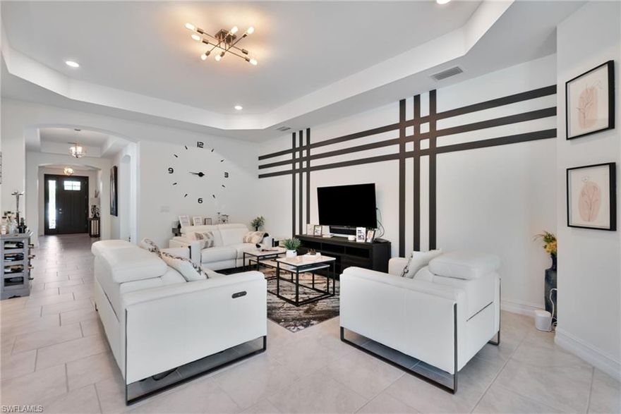 Refined elegance meets modern Florida luxury in this impeccably kept, one-owner residence built in 2020, located within the exclusive gated enclave of Seasons at Bonita. Thoughtfully designed with a light-filled, open-concept layout, the home offers expansive living spaces, well-appointed bedrooms, and sophisticated finishes that create a seamless blend of comfort and style. Every detail reflects pride of ownership and timeless design, making the home ideal for both elevated everyday living and elegant entertaining. Residents enjoy a resort-inspired lifestyle with a grand clubhouse, stunning pool and spa, state-of-the-art fitness center, tennis, pickleball and bocce courts, scenic walking paths, and dog parks. Perfectly situated just minutes from Bonita Beach’s sugar-sand shores, premier dining and shopping, and with effortless access to Naples, Estero, and RSW International Airport, this exceptional property delivers privacy, luxury, and convenience in one of Bonita Springs’ most coveted communities.