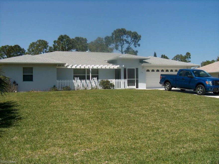 BACK ON THE MARKET. BUYERS FINANCING FELL THROUGH. OWNER IS MOTIVATED TO SELL!! Are you looking for a home with lot's of room? You've found it! This 2005 1,800 + sq ft custom built home located in a convenient area of Lehigh sets on a half acre lot with beautiful trees on a dead end street with no through traffic. Lot's of storage with a spacious two car garage, 2 outbuildings, (1 with power) It will ensure that you have all the room you need for your toys. Inside you will find two large guest rooms, each with a walk in closet and a large master bedroom with a sitting area. A great place to relax after a busy day! The screened in patio runs the full length of the house, perfect for entertaining. Main area of the house is tile and carpet in the bedrooms. This home was built with care. Call me today to schedule a private showing.. This home won't last long!