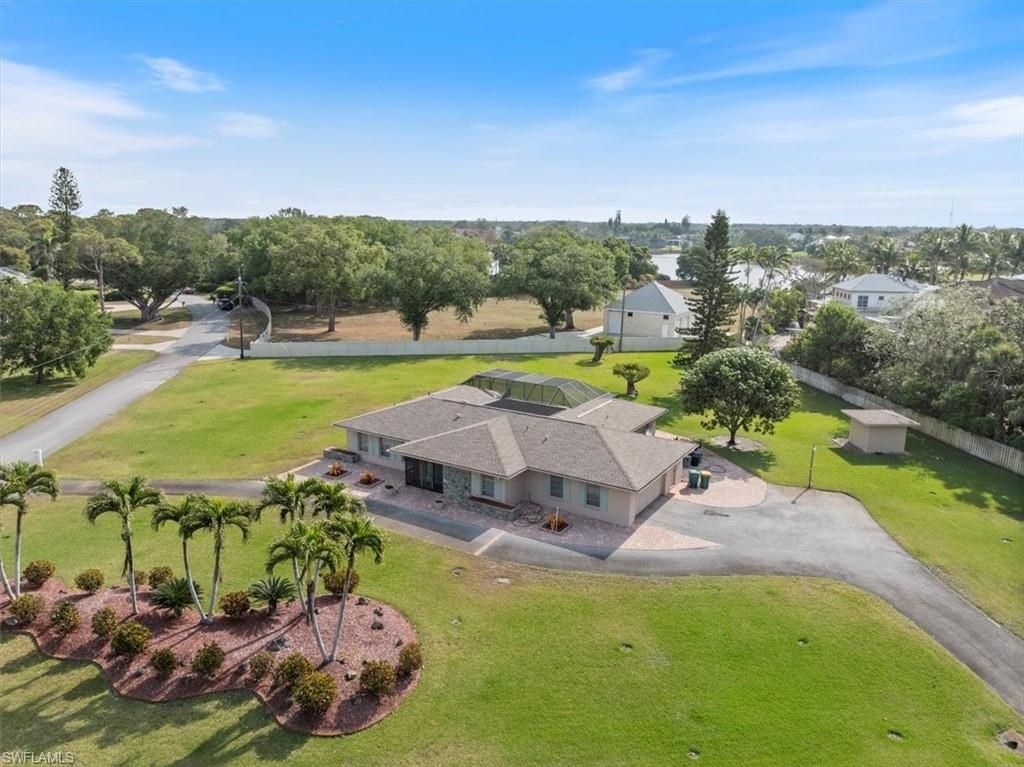 Photo of 50 Cajeput DR, NAPLES, FL 34108 (MLS # 226013162)