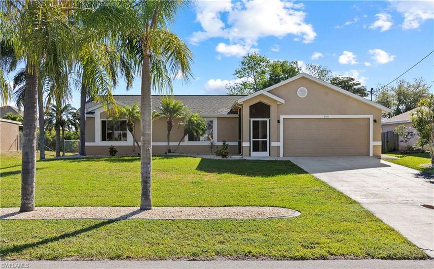 ONE OF THE LARGEST POOLS in Cape Coral (heated and 2 waterfall features) - PERFECT for entertaining or a LAP enthusiast.  Oversized covered Lanai and Screen Cage. Spacious Master Suite with large walk-in closet, double vanity large walk-in shower.  Bright and sunny kitchen with large double pantry, breakfast bar, bay dinette with patio doors to pool and Lanai.  Large bedroom and closets, hall linen. Vaulted Great Room opens to Pool. Split Bedroom floor plan.  Generous sized garage. Landscaped and mature palms.  All assessments are PAID.  NEW ROOF 2023. REPLUMBED 2021. New Electric Panel 2021, New Water Heater 2022. No flooding during Ian.