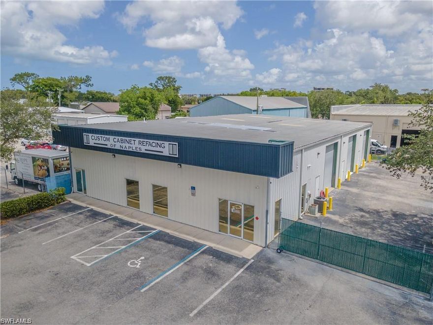 This newly updated industrial flex property offers a versatile blend of office, showroom, and warehouse space in one of Naples’ most desirable industrial corridors. The front 1,500 square feet features a refreshed, air-conditioned office/showroom area with new flooring, fresh paint, a kitchen, restroom, and dedicated server room. This finished space is fully separated from the adjoining 4,500 square feet of warehouse bays.

One of the warehouse bays—totaling 1,500 square feet—includes its own restroom and a hurricane-rated overhead door. Beyond a firewall lies an additional 3,000 square feet of air-conditioned warehouse space, equipped with two hurricane-rated overhead doors. Both warehouse sections offer clean, professional interiors with drywall finishes, dropped acoustic ceilings, and recessed fluorescent lighting. Flooring throughout the warehouse areas features a durable, non-static aircraft-hangar-grade coating. Each bay is accessible through 12' x 14' automatic overhead doors that open to a securely fenced yard with eight extra parking spaces.

The property also includes approximately 8,630 square feet of newly marked asphalt parking in front of the building, offering ten designated parking spaces for employees and visitors. The fenced yard area is secured by a 6-foot chain-link fence and a 15-foot rolling gate.

Whether for an owner-user or investor, this property presents a rare opportunity in a high-demand Naples industrial park with excellent proximity to major highways and nearby airports.