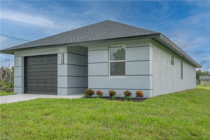 New Construction | 4 Bedrooms | 2 Full Baths | 1 Half Bath | 1 Car Garage | Volume Ceilings | Recessed Lights | 8 Foot Doors | Tile Throughout | Granite Kichen | Stainless Appliances | Impact Windows & Doors. No HOA fees!
