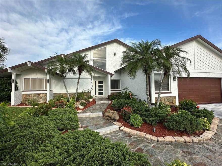 Exceptional 5-Bedroom 3-bathroom pool home Masterpiece! A unique blend of Modern and Rustic styles on a Wide Gulf Access Canal in the most prestigious Rose Garden area of SW Cape Coral, Fl. This high elevation home never flooded in any hurricane including Ian. Discover a one-of-a-kind home that beautifully marries modern elegance and contemporary finishes with rustic charm creating a unique ambiance that sets it apart from the rest. This completely renovated 2 story residence showcases a remarkable design and stands out as a true gem in the market. With 5 generously sized bedrooms, including 2 luxurious master suites, each room provides a tranquil retreat for family and guests alike, ensuring comfort and privacy. The heart of the home is the stunning designer kitchen, equipped with high-end appliances, custom European cabinetry, and ample space for culinary creativity. This, combined with a stunning water views is perfect for hosting gourmet dinners or casual brunches! Enjoy endless entertainment in the game room with the billiard table and dart board, where you can challenge friends or unwind with family in style. The expansive two-story living space features a modern open concept design, allowing for a seamless flow from the kitchen to the living area, ideal for gatherings and celebrations. Step outside to your own oasis, both in front and in back! The meticulously designer landscaped with a brand new paver driveway boast a pristine pool area and a rustic garden shed that doubles as a grill house and outdoor dining space, perfect for relaxation and fun! Also, have lots of fun in your fully functional, air condition garage that doubles as a professional karaoke bar complete with lights, sound system and 3 televisions, ideal for gatherings and entertainment. This extraordinary property offers a lifestyle of luxury and leisure, making it perfect for those who appreciate the finer things in life. Don’t miss the opportunity to own this unique treasure! Schedule your private viewing today and step into the home of your dreams!