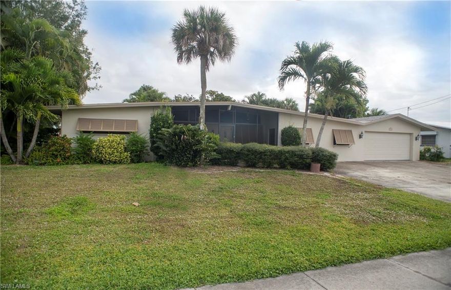 If you are looking for a direct sailboat access home with extra storage then look no further. Over 1/3 of an acre! This spacious home has four bedrooms and three full baths, This home has been in one family since it was built, and the pride of ownership is evident. The kitchen has corian counters, plenty of cabinets and prep area. The home could easily be split to make half of the home a mother-in-law suite. Start living the good live on the water and enjoy all the water sports that SW Florida has to offer. THIS IS A GREAT OPPORTUNITY!