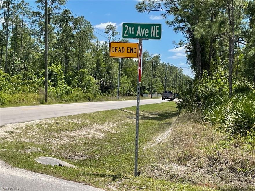 Beautiful lot, 2.5 acres in Naples, Golden Gate Estates. This lot is on a paved public street, surrounded by nice newer homes. Build your dream home in this wonderful location.