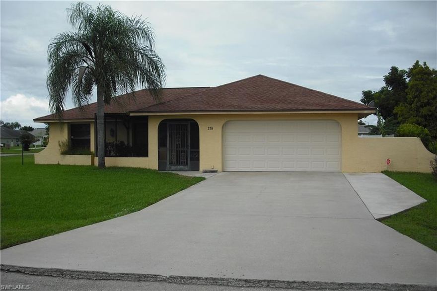 Splendid 3 bedrooms, 2 baths home with all tiled floors, upgraded kitchen cabinets, granite counter tops, appliances, including washer and dryer. Has over 1500 sq ft of living area, attractive light fixtures and ceiling fans, upgraded bathroom cabinets, jetted tub in the master bath with separate shower.Front & back screened lanai with tiled floors.  
Master bedroom and one guest bedroom have the California shelves to easy organize all of you clothing and other items. House comes with a Rainsoft water treatment system, 2 orange trees and an avacado tree. Its a beauty and wont last long on the market.