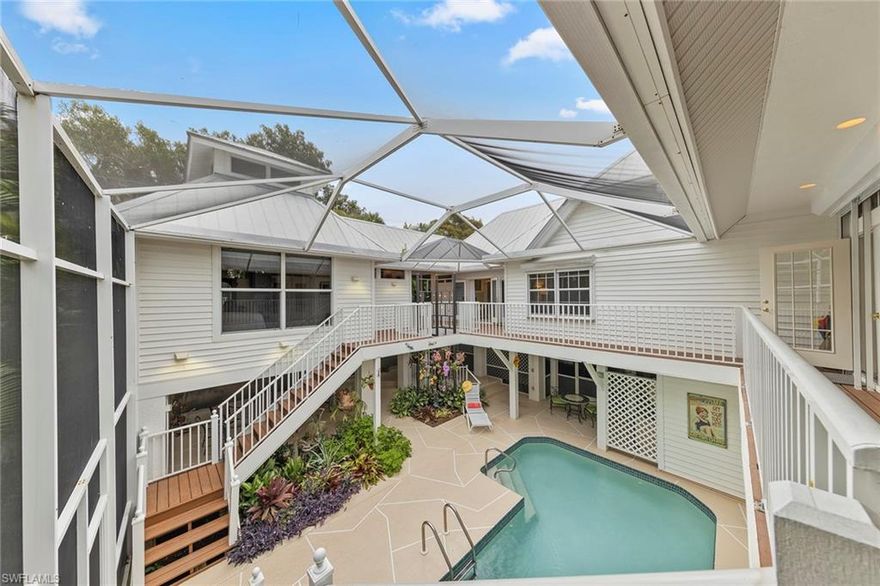 Vacation home extraordinaire! 5 bedrooms, 5 baths surrounding a vast screened atrium courtyard pool and spa oasis awaits. Designed to utilize as a 3, 4 or 5 bedroom vacation retreat. Spacious yet intimate. Room to spread out and to be together. Unique and versatile architectural details to include 3 large private master en-suite retreats, soaring ceilings, airy porches, wrap around decking with tucked away niche seating overlooking the pool providing plenty of lounging off the living area and lots of French doors. Tropical flora surrounds the home lending total seclusion. Pool level offers a wet bar to serve guests cool beverages and meals in cloistered alcoves. This is a family mecca where multiple generations and friends can gather together to enjoy a private shell lane leading to a white sandy beach or wander into Captiva village to dine, shop or take an excursion. Outdoor shower available after sunning or shelling. Plenty of storage. Great rental income with even more potential.